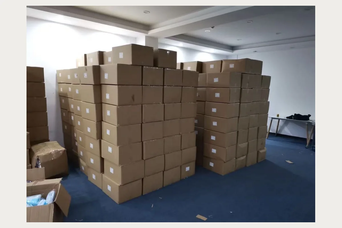 Complete warehouse view with labelled export cartons used as physical verification evidence