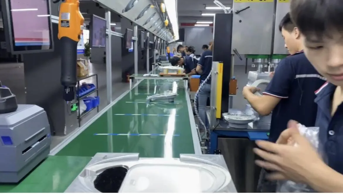 Workers on a production line at a verified factory in Dongguan, China