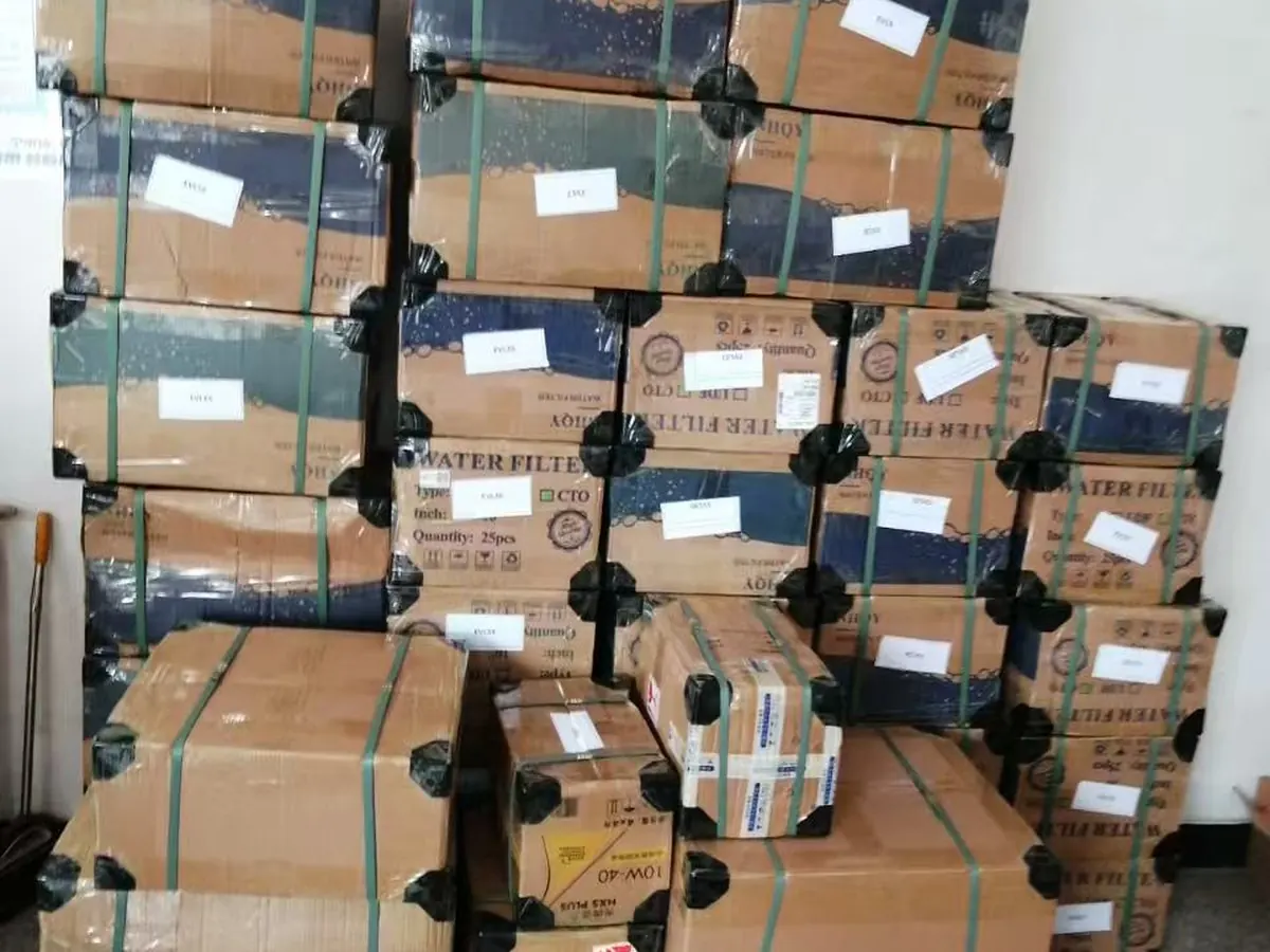 Export cartons checked and labelled during supplier verification before shipment from China