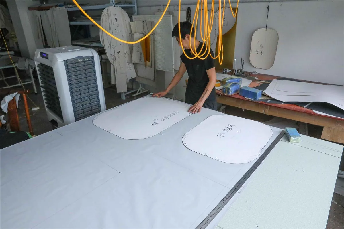Custom OEM garment production and pattern cutting at a factory in China