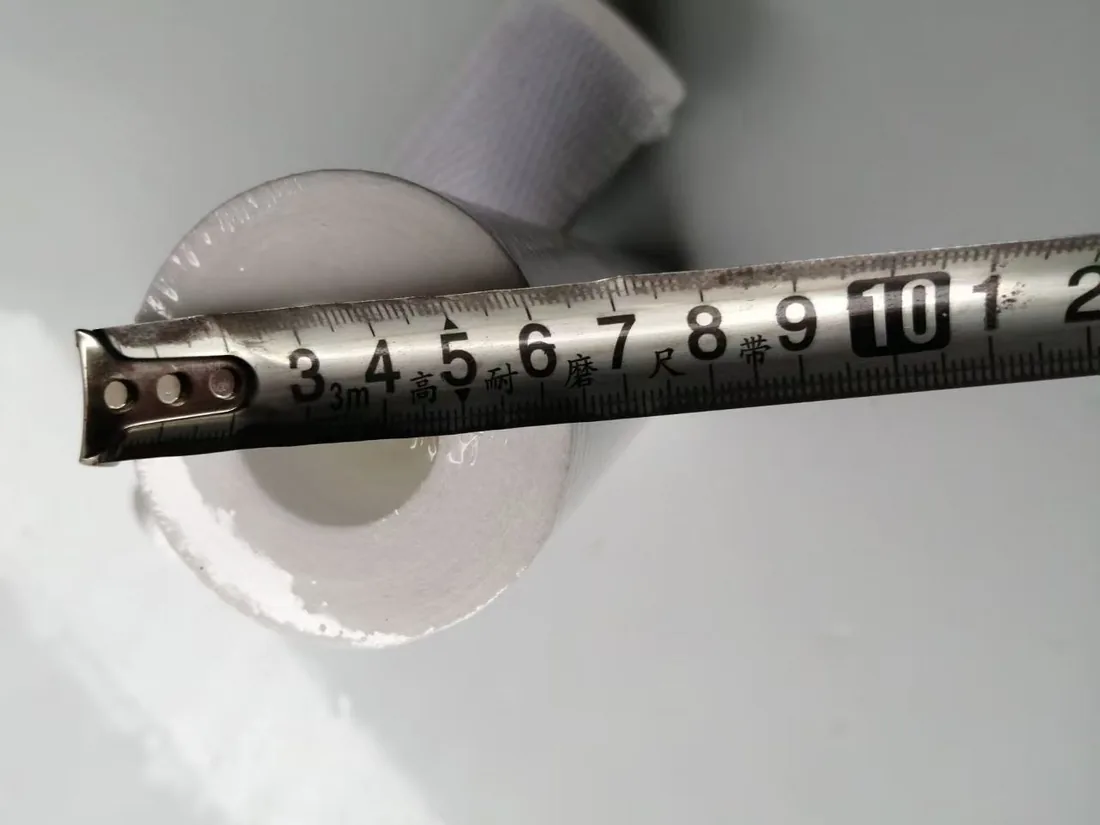 Complete diameter measurement showing the filter end face and tape across the product